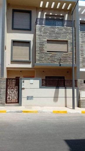 Brand new triplex with small garden